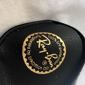 Ray-Ban polarized sunglasses brown round lenses tortoise frame made in Italy.